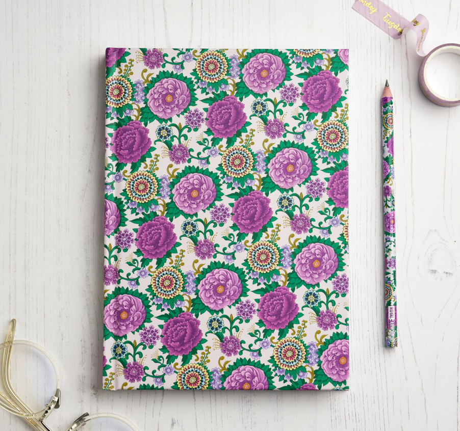 Floral pattern notebook and pencil